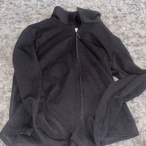 black zip up high neck top
